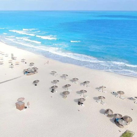 Tolip North Coast Hotel El Alamein Exterior foto Aerial view of the beach