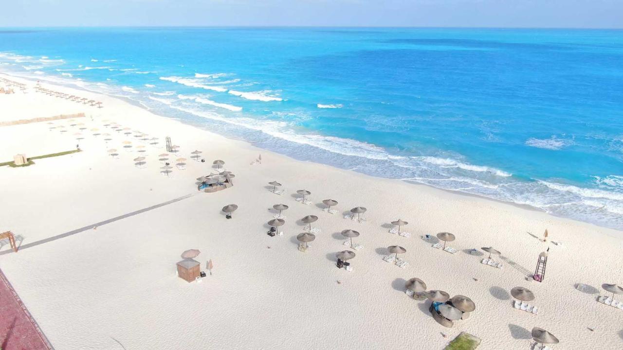 Tolip North Coast Hotel El Alamein Exterior foto Aerial view of the beach