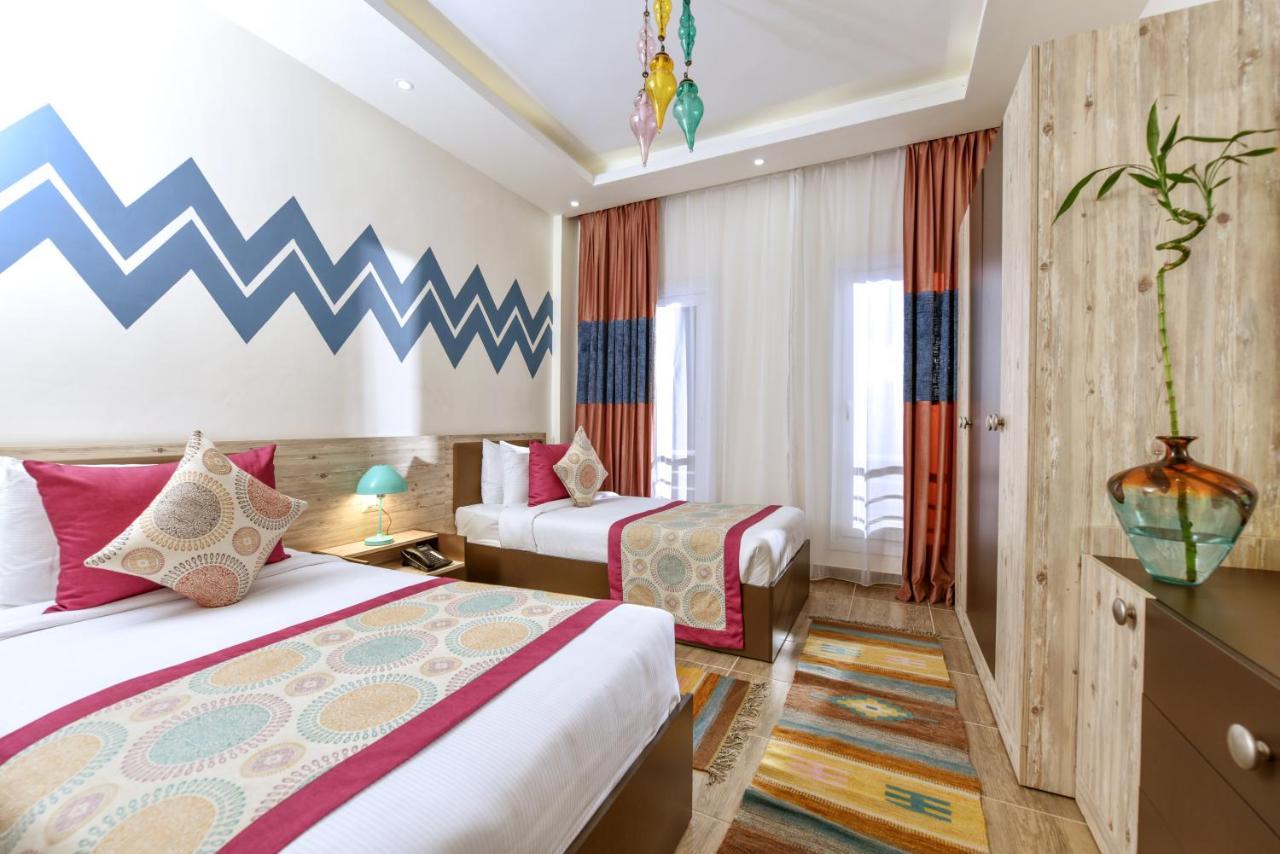 Tolip North Coast Hotel El Alamein Exterior foto A room at the hotel