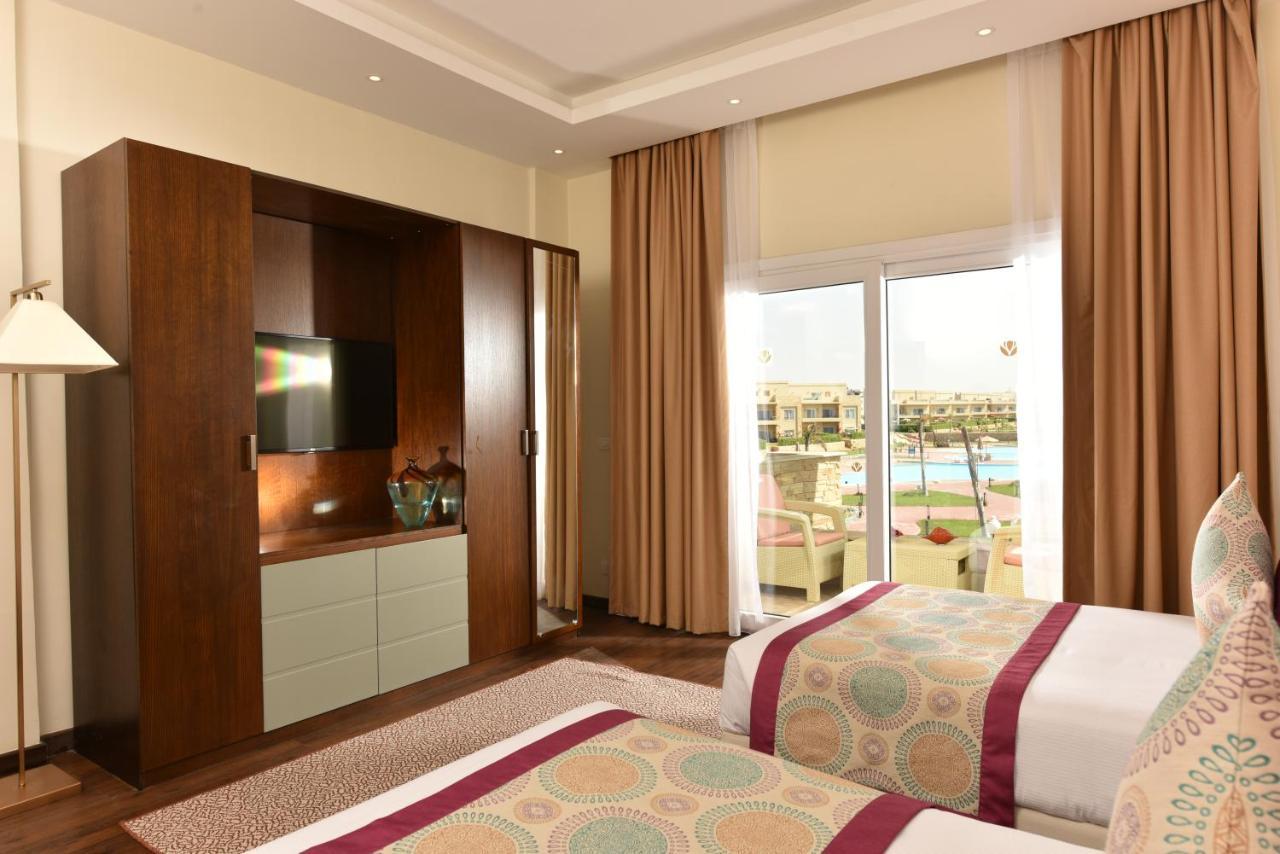 Tolip North Coast Hotel El Alamein Exterior foto A bedroom at the hotel