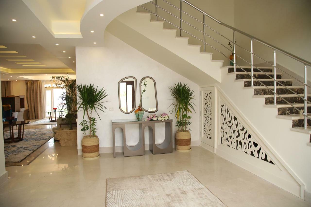 Tolip North Coast Hotel El Alamein Exterior foto A modern staircase