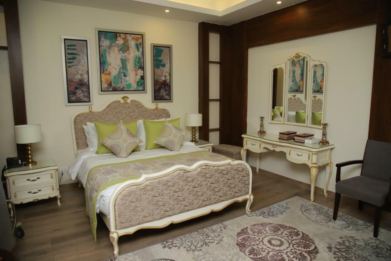 Tolip North Coast Hotel El Alamein Exterior foto A bedroom at the hotel
